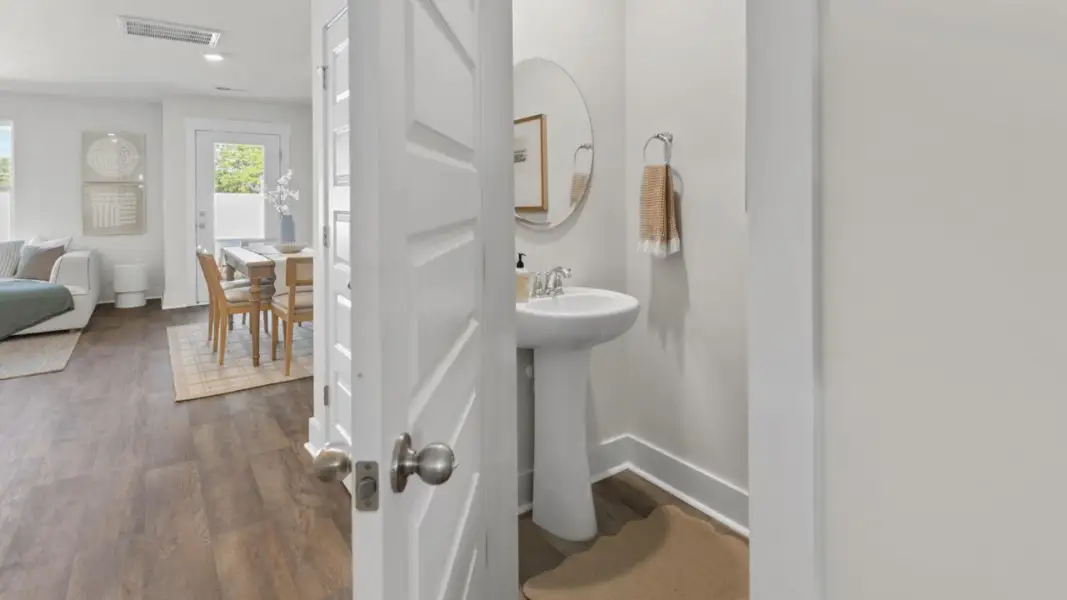 Furnished interior in a model home at The Townes at Cedar Hill Landing in Navassa (Image 20).
