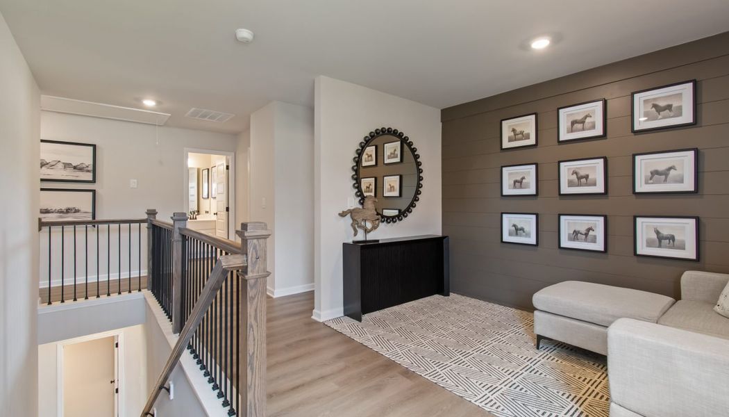 Furnished interior in a model home at Kentmere in Auburn (Image 42).