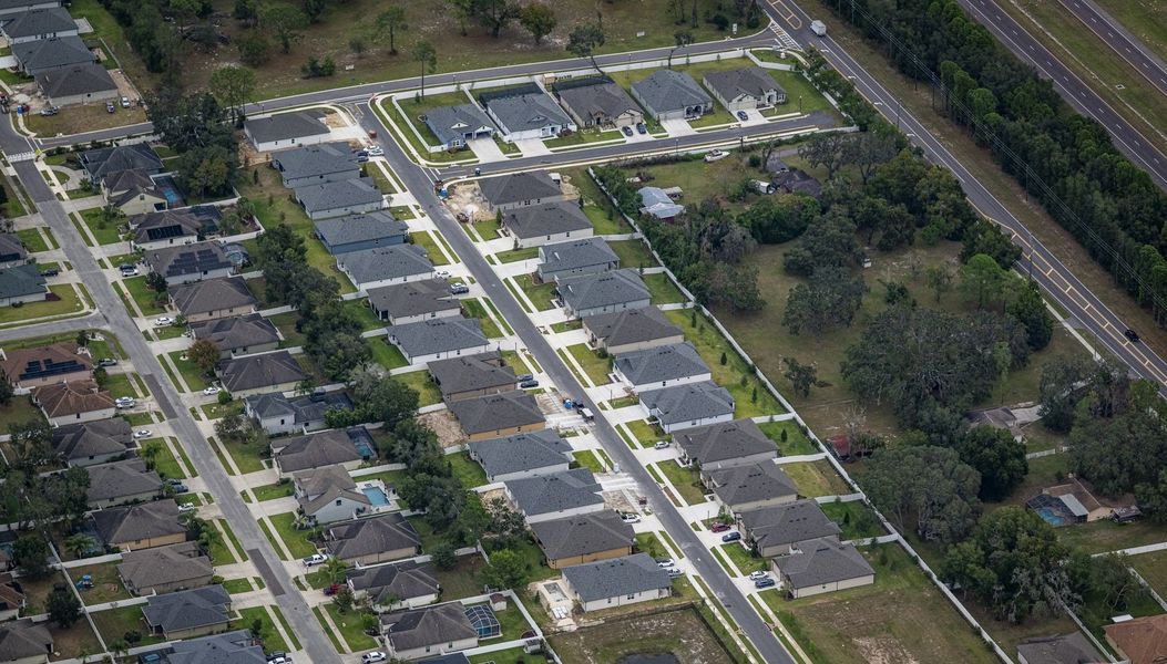 Aerial view of the Whiting Estates community in Spring Hill, FL, showing layout and nearby surroundings (Image 6). Aerial view of the Whiting Estates community in Spring Hill, FL, showing layout and nearby surroundings (Image 6).