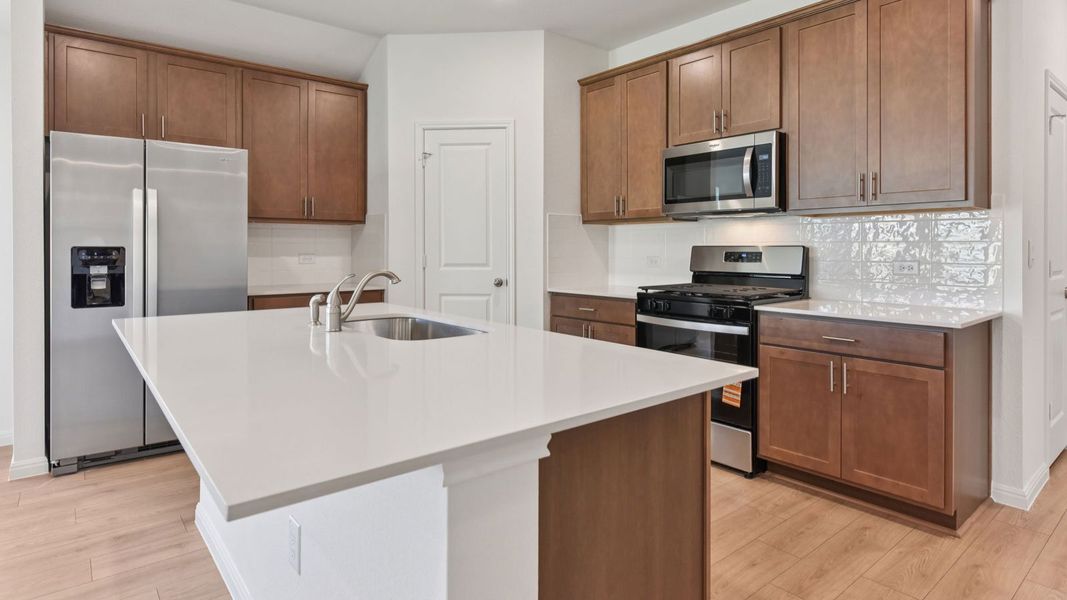 Furnished interior in a model home at Carillon in Manor (Image 5).