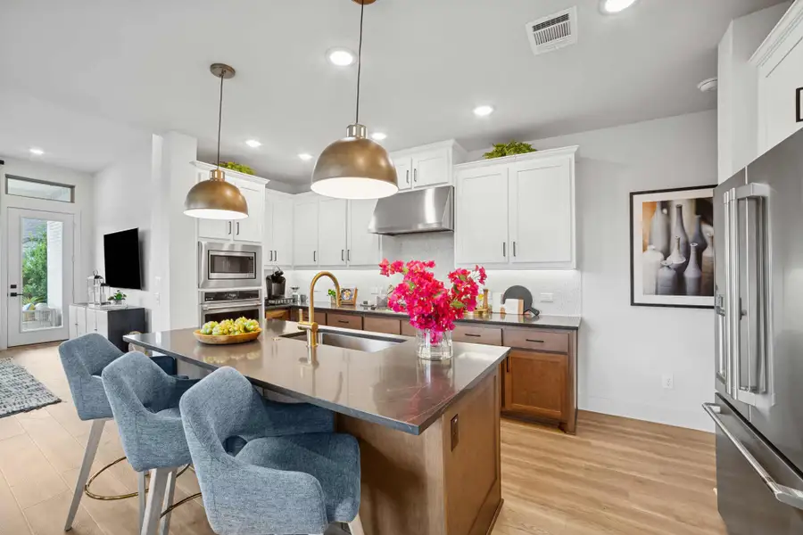 Furnished interior in a model home at Solterra - Garden Series in Mesquite (Image 7).