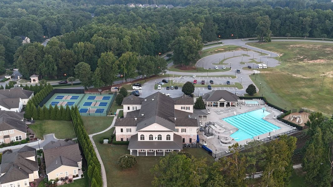 Aerial view of the South Lake Townes at Flowers Plantation community in Clayton, NC, showing layout and nearby surroundings (Image 16).