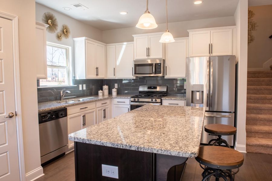Furnished interior in a model home at Hidden Lake Preserve in Greenville (Image 4).