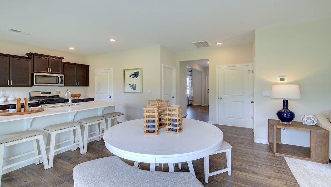Furnished interior in a model home at Tap Root Farms in Fletcher (Image 10).