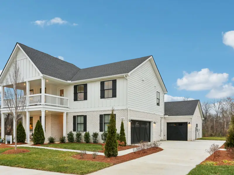 Front exterior of a home in the Station Hill - Estate Series community, located in Franklin, TN (Image 2).