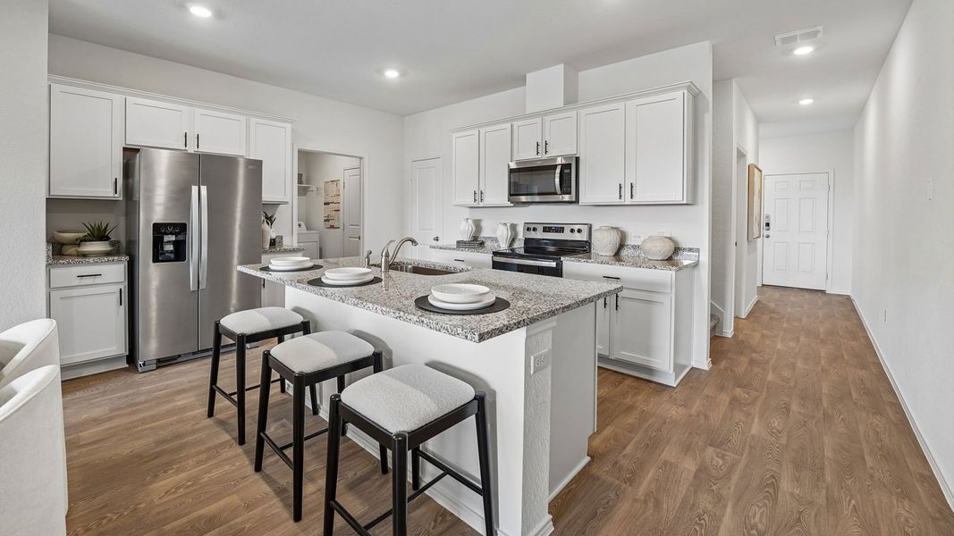 Furnished interior in a model home at Palomino in Manor (Image 24).