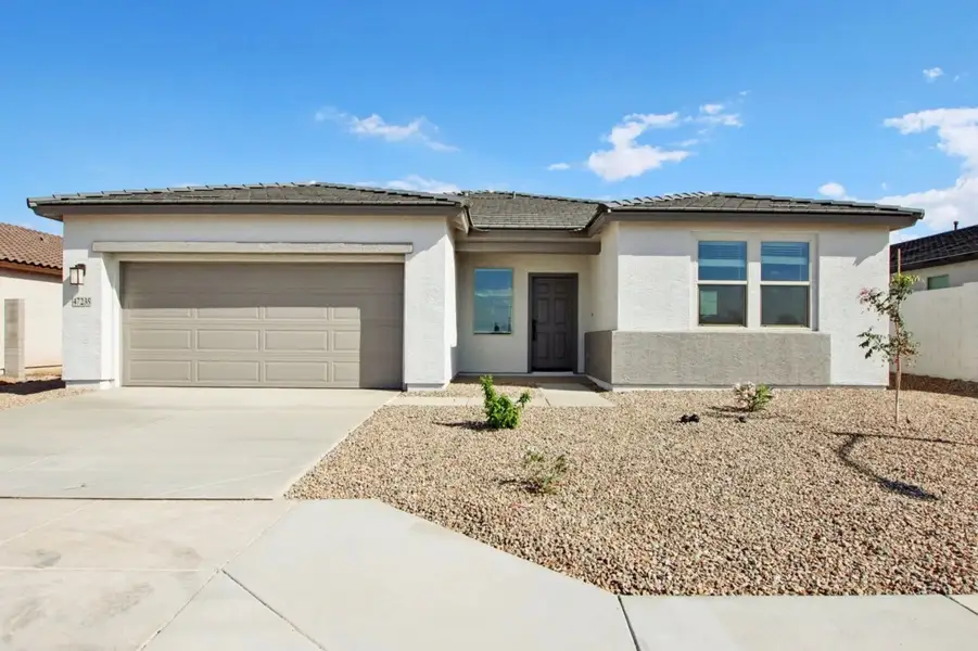 Front exterior of a home in the Sol at Amarillo Creek community, located in Maricopa, AZ (Image 5).