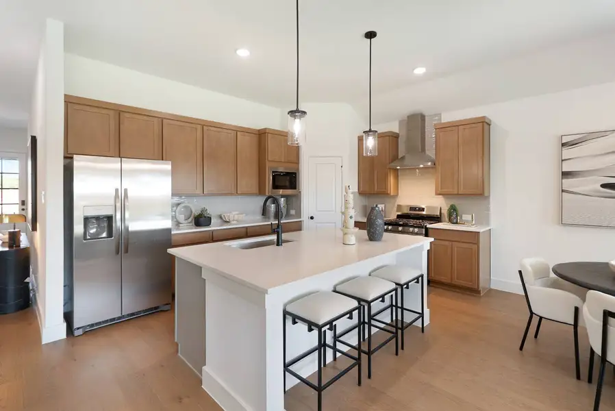 Furnished interior in a model home at Bryson Ranch in Pilot Point (Image 3).