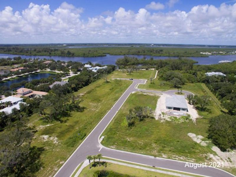 Aerial view of the The Strand community in Vero Beach, FL, showing layout and nearby surroundings (Image 46).
