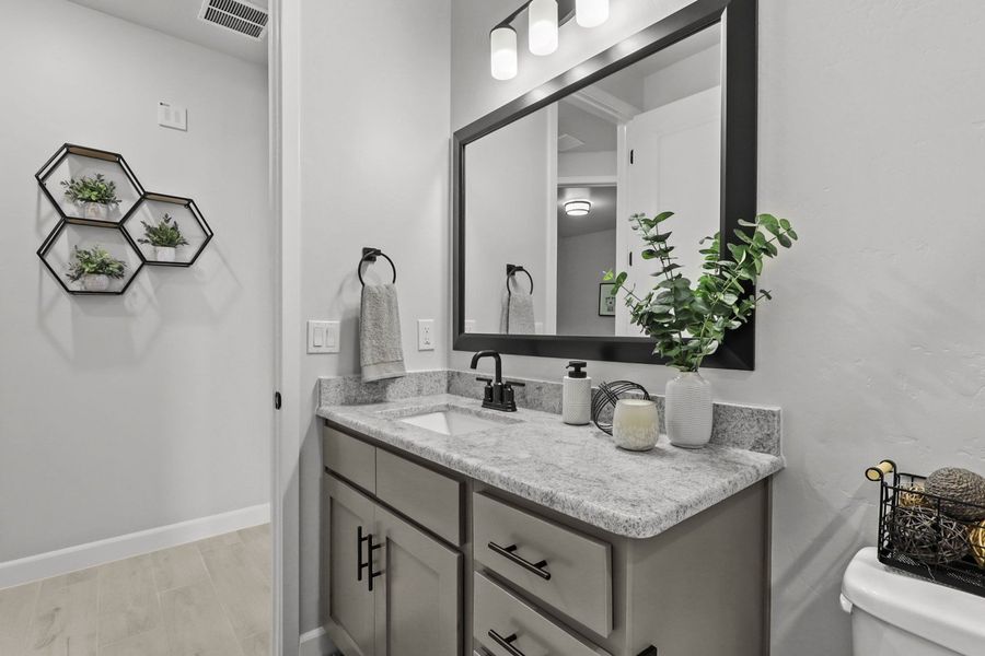 Furnished interior in a model home at Paseo Del Este in El Paso (Image 38).