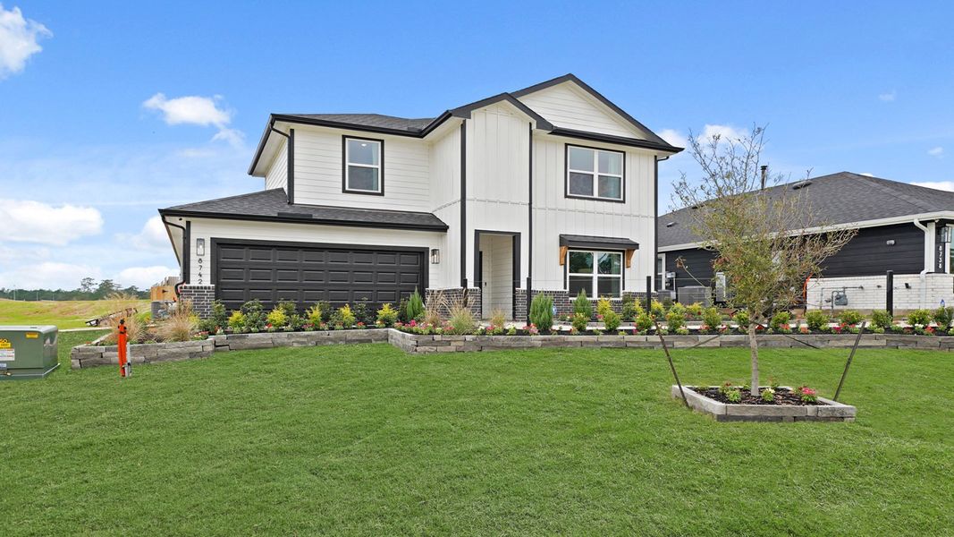 Front exterior of a home in the Chapel Lakes community, located in Montgomery, TX (Image 12).