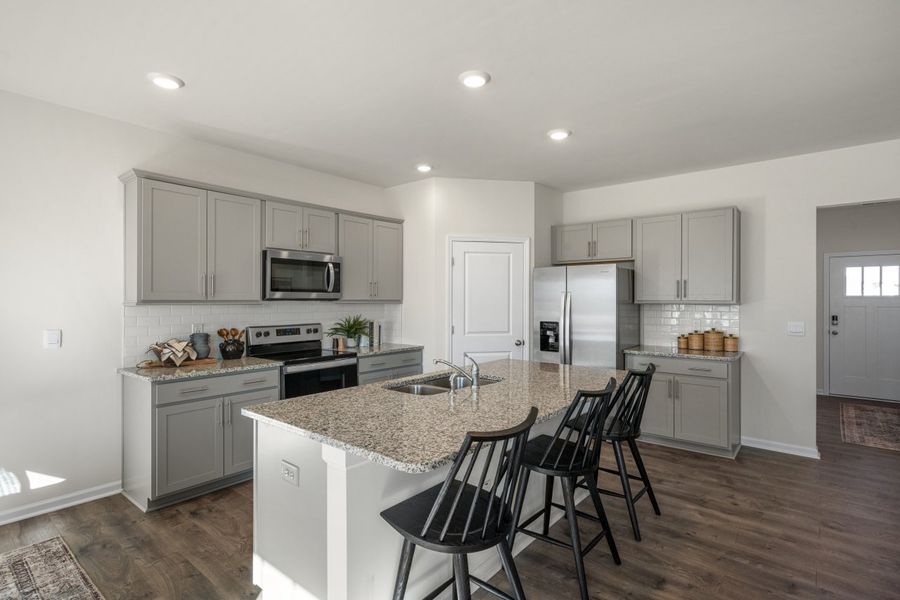 Furnished interior in a model home at Hoke Loop Ridge in Fayetteville (Image 3). Furnished interior in a model home at Hoke Loop Ridge in Fayetteville (Image 3).
