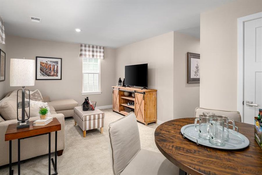 Furnished interior in a model home at Spring Branch Townhomes in Smyrna (Image 6).
