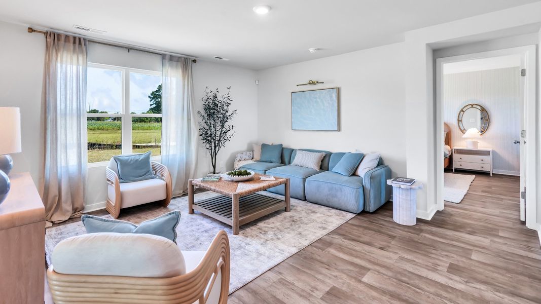 Furnished interior in a model home at Driftwood in Richlands (Image 9).