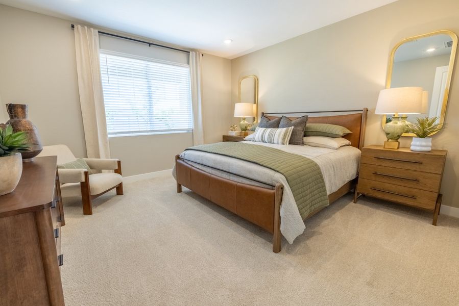 Furnished interior in a model home at Blossom Rock Reserve Series in Apache Junction (Image 21).
