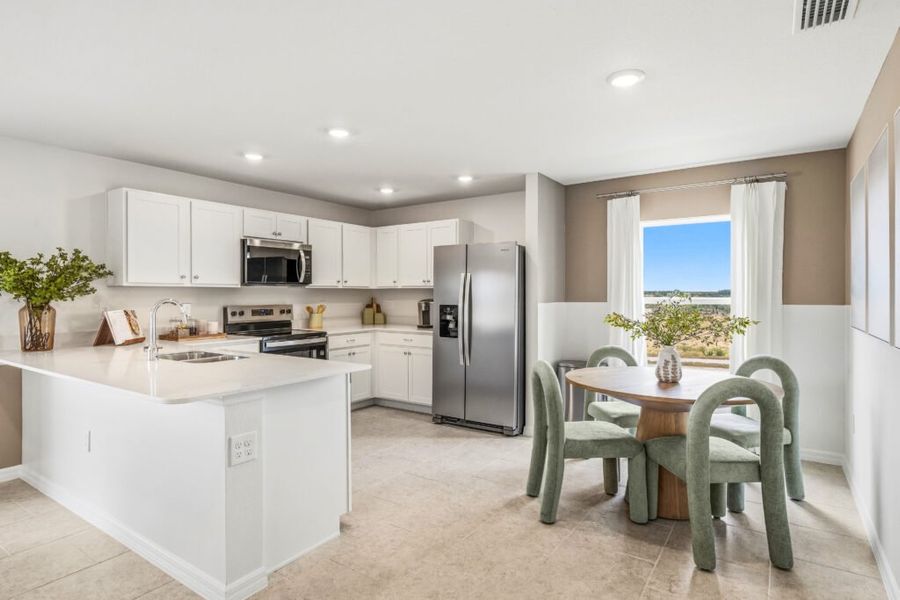 Furnished interior in a model home at Citrus Ridge in Lake Wales (Image 4).