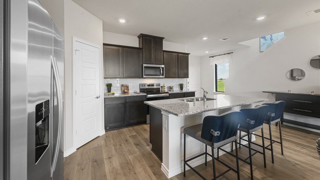 Furnished interior in a model home at The Villages of Hurricane Creek Townhomes in Anna (Image 22). Furnished interior in a model home at The Villages of Hurricane Creek Townhomes in Anna (Image 22).