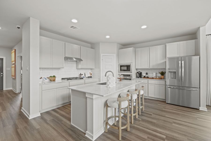 Furnished interior in a model home at Grand Magnolia in Magnolia (Image 8).