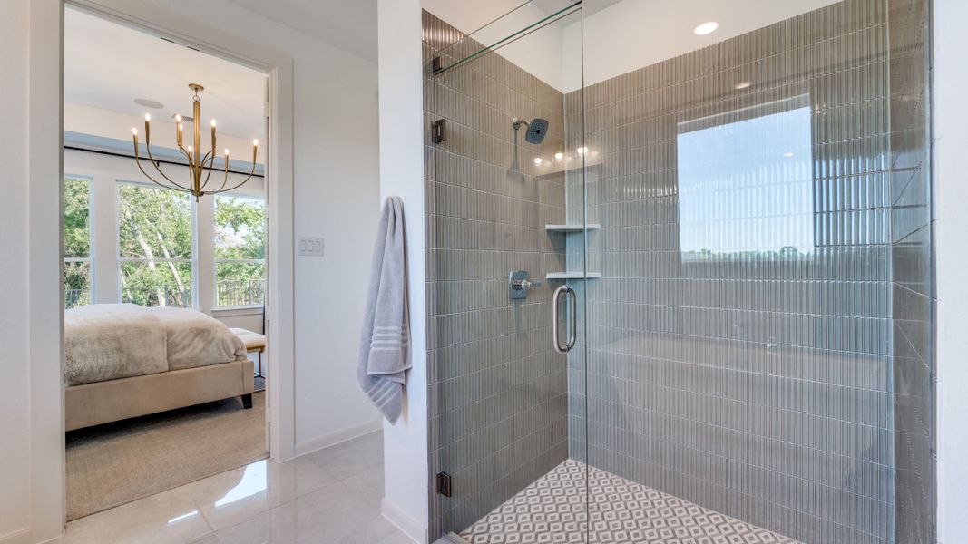 Furnished interior in a model home at Painted Tree - South in McKinney (Image 29).