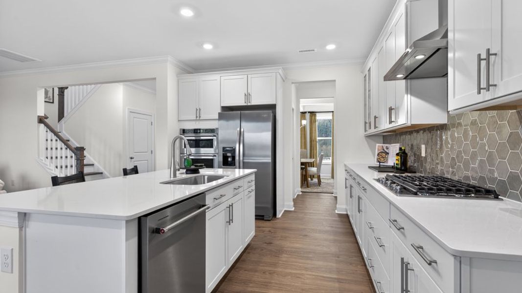 Furnished interior in a model home at The Grove at Winston Pointe in Clayton (Image 5).