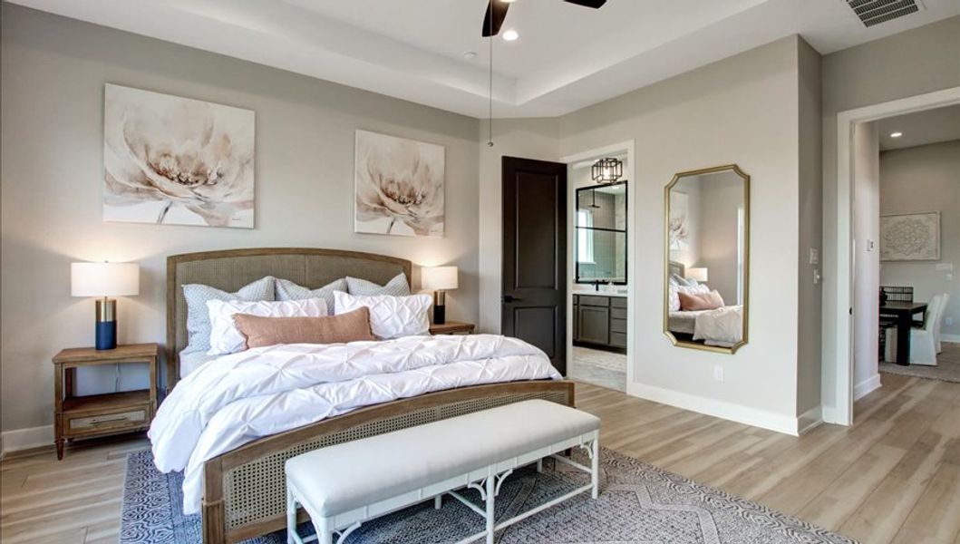 Furnished interior in a model home at Sunterra 40 in Katy (Image 33).