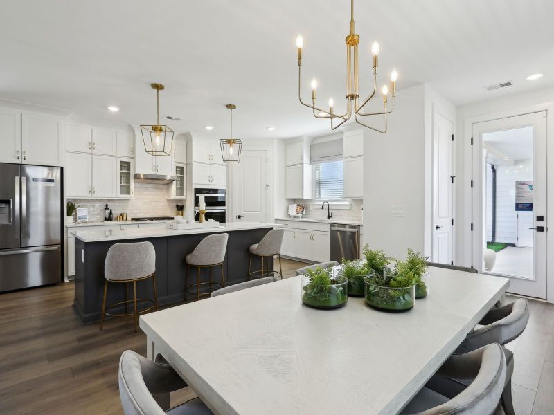 The open-concept floorplan allows for an easy flow between the kitchen and dining areas.