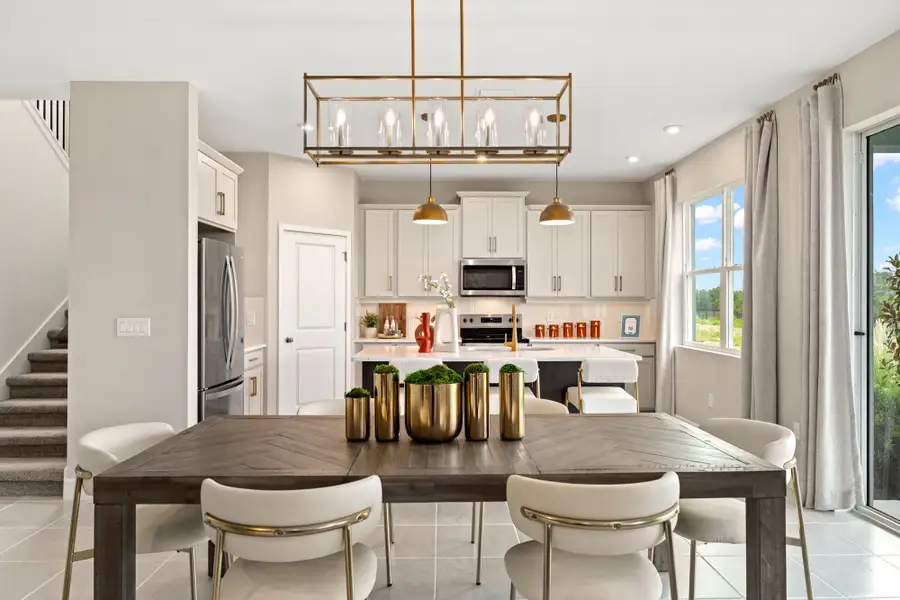 Furnished interior in a model home at Rainwood in Groveland (Image 7).