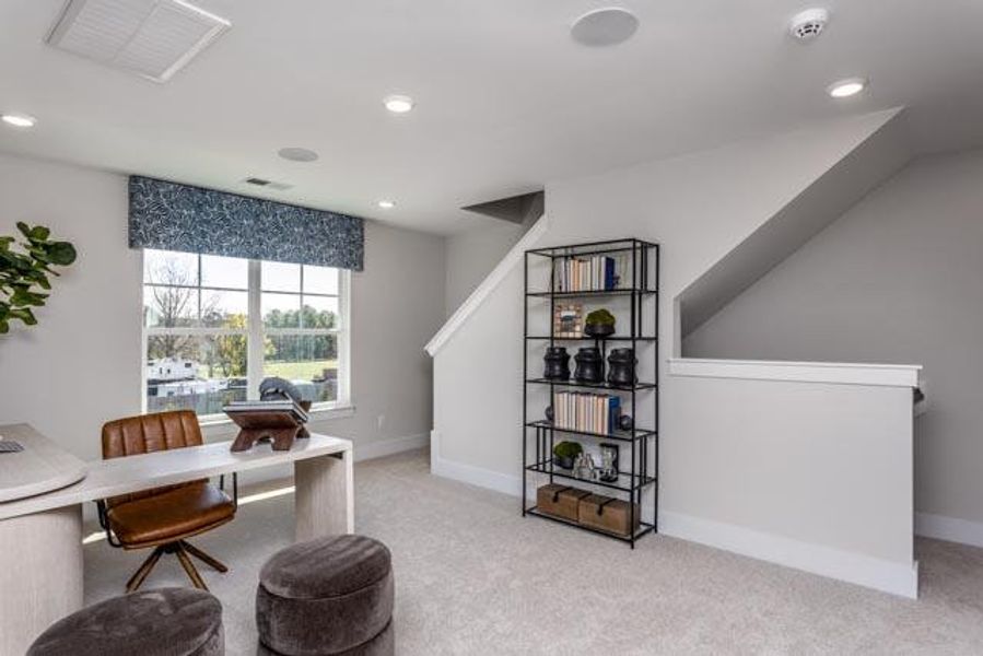 Furnished interior in a model home at Black Forest Pointe in Benson (Image 24).