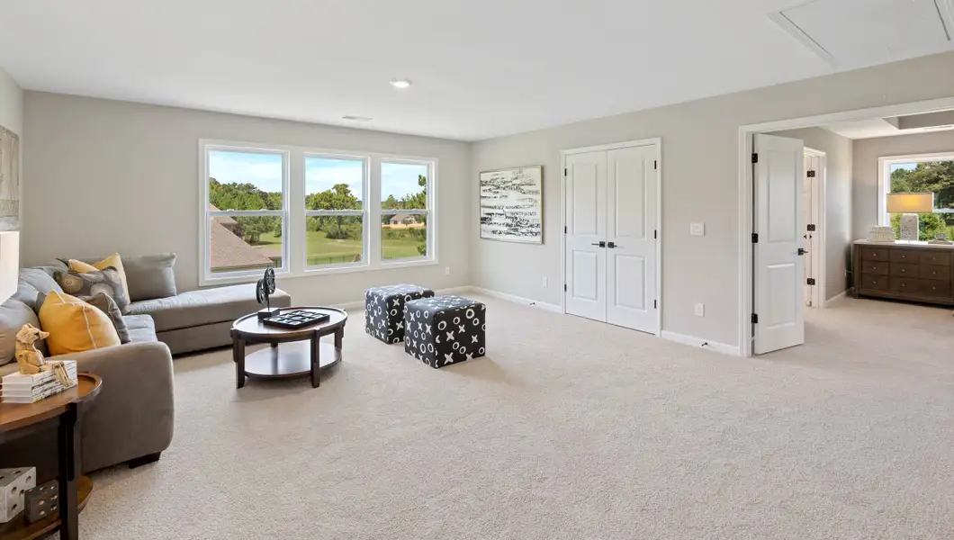Furnished interior in a model home at Hunters Creek in Greenwood (Image 28).