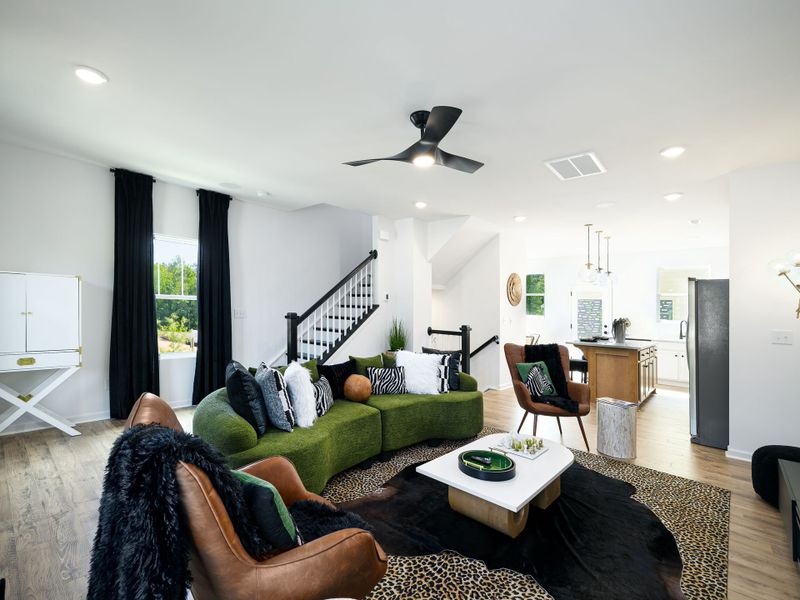 Furnished interior in a model home at Village at Reedy Creek Townhomes in Charlotte (Image 8). Furnished interior in a model home at Village at Reedy Creek Townhomes in Charlotte (Image 8).