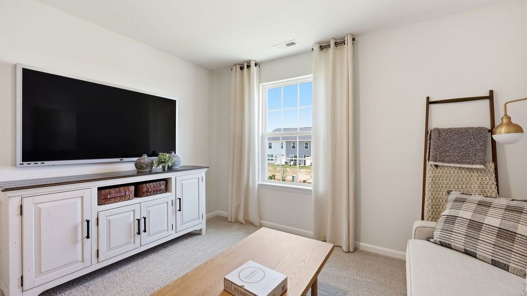 Furnished interior in a model home at Carter Ridge in Greenville (Image 24).