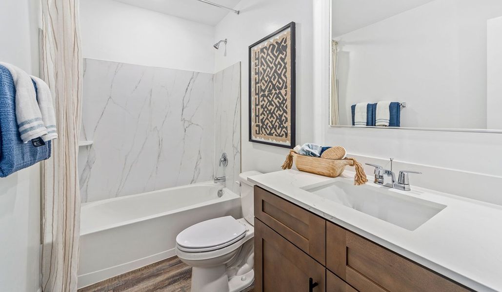 Furnished interior in a model home at Redford Estates in Tucson (Image 29).