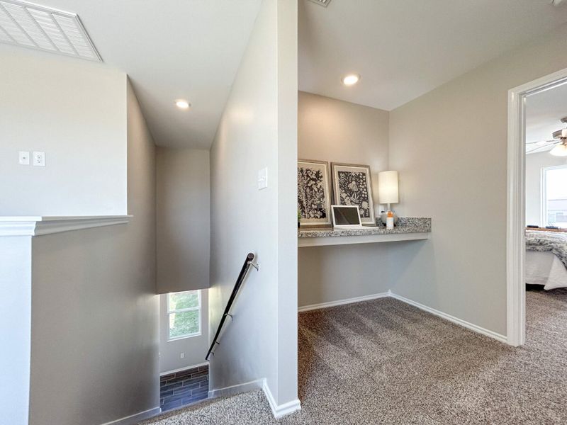 Furnished interior in a model home at Cuatro Vientos Sur in Laredo (Image 19).