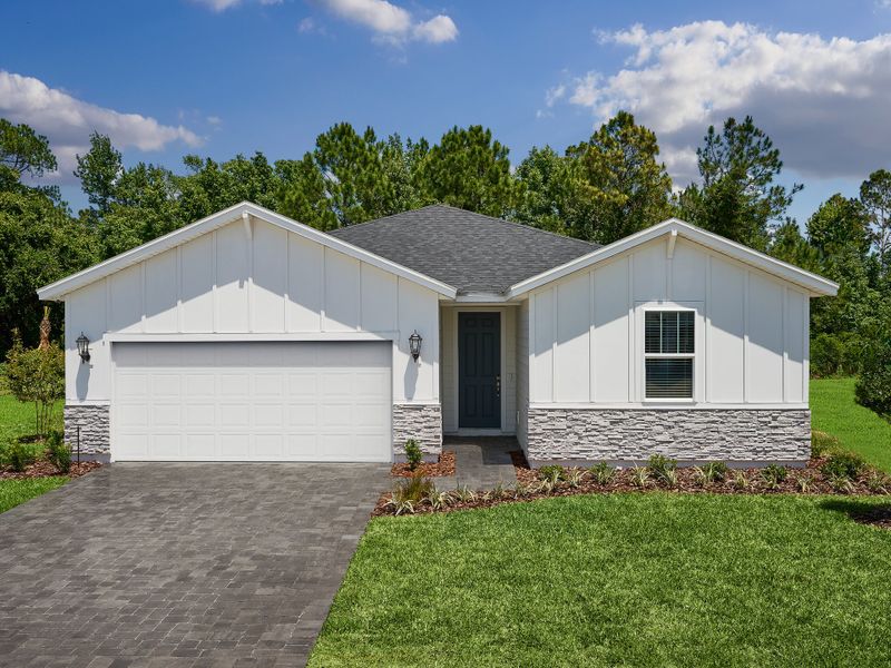 Front exterior of a home in the Colbert Landings - Signature Series community, located in Palm Coast, FL (Image 4).