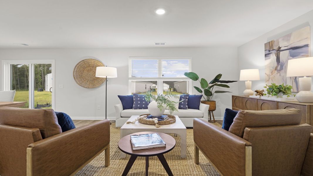 Furnished interior in a model home at The Groves at Bees Creek in Ridgeland (Image 17).