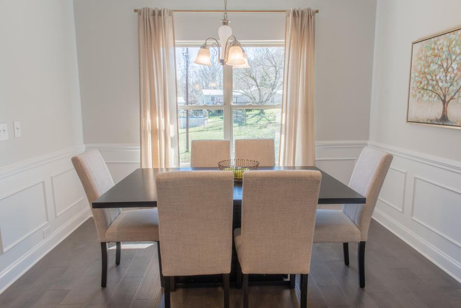 Furnished interior in a model home at Hidden Lake Preserve in Greenville (Image 3).