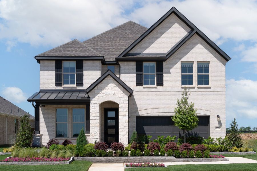 Front exterior of a home in the Saratoga community, located in Aubrey, TX (Image 3).