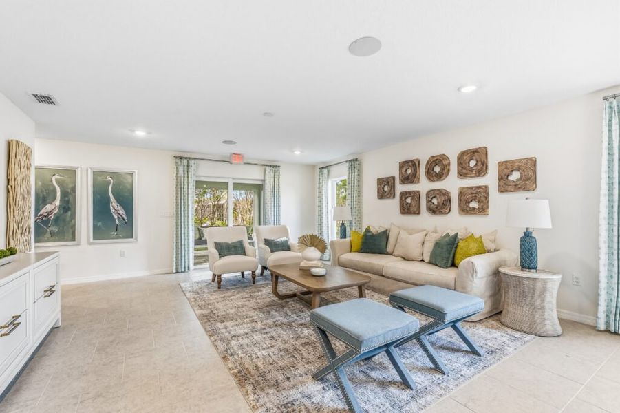 Furnished interior in a model home at Spanish Lakes in Port St. Lucie (Image 9).