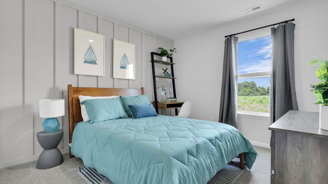 Furnished interior in a model home at The Ranch in Holly Hill (Image 23).