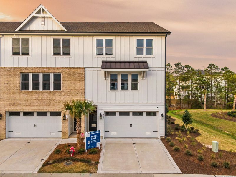 Front exterior of a home in the Anchors Bend Townes community, located in Wilmington, NC (Image 18).