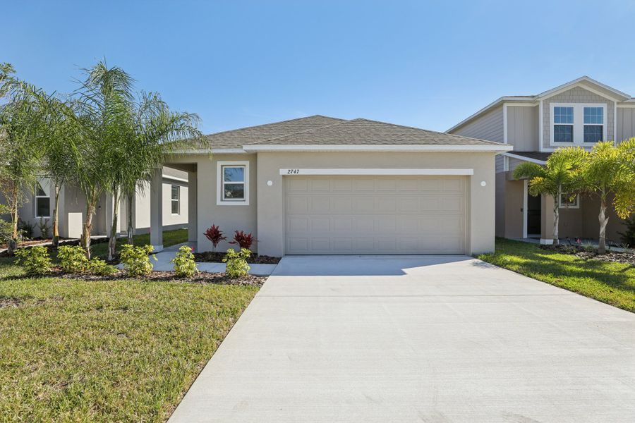 Front exterior of a home in the Villamar community, located in Winter Haven, FL (Image 4).