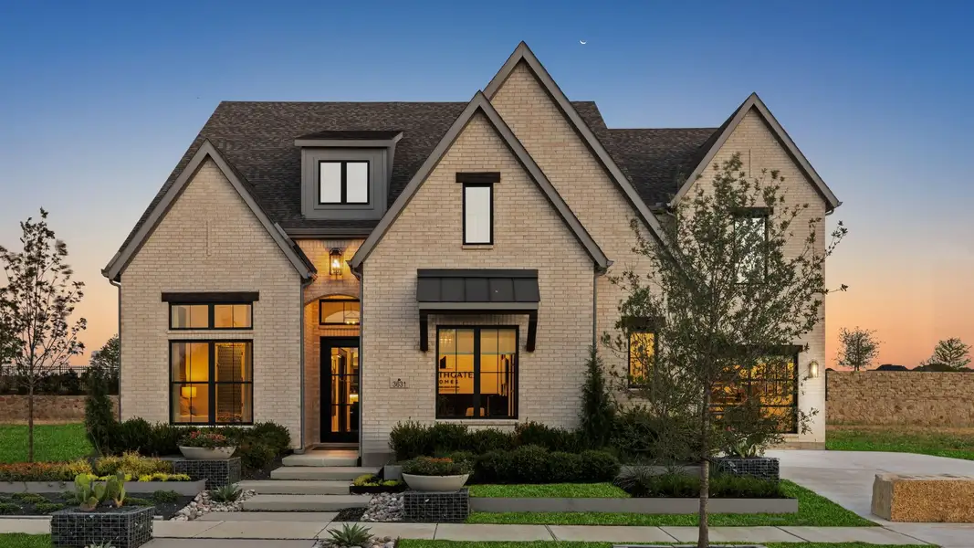 Front exterior of a home in the Windsong Ranch 71' Series community, located in Prosper, TX (Image 5).