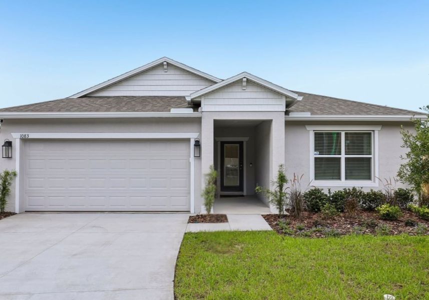 Front exterior of a home in the Highland Park community, located in Newberry, FL (Image 4).