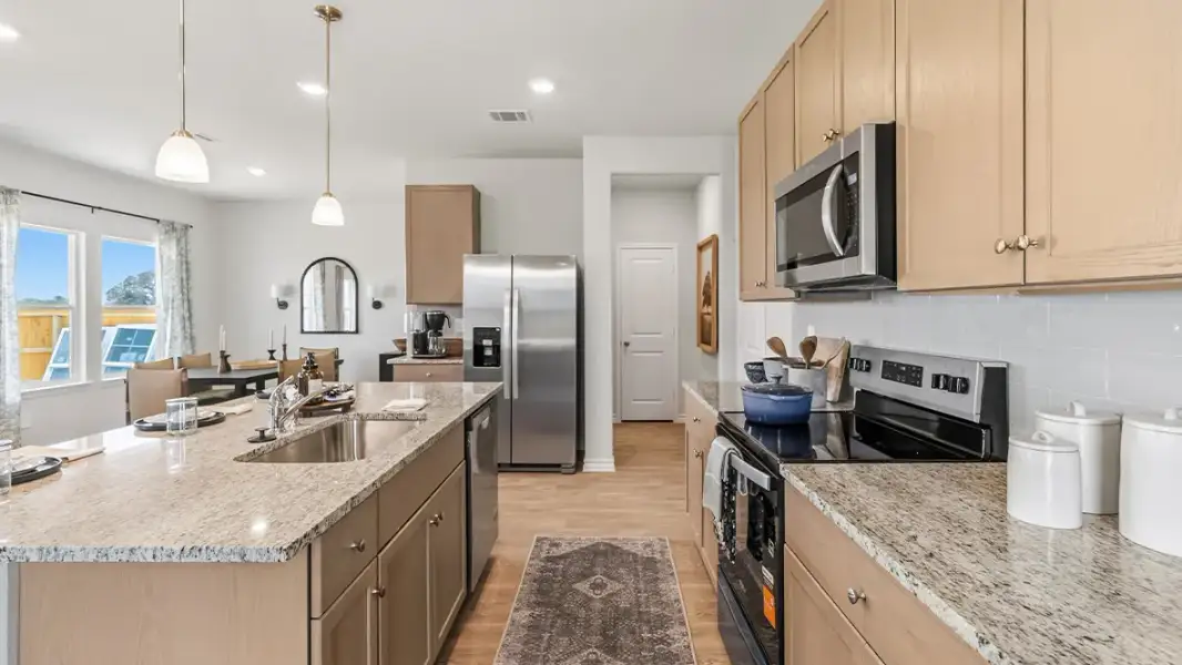 Furnished interior in a model home at Saddle Ridge Estates in Lytle (Image 17).