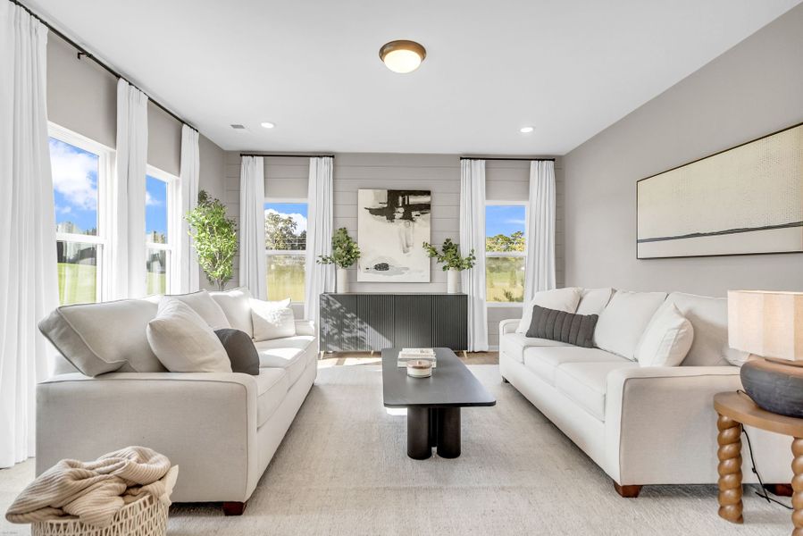 Furnished interior in a model home at Reeves Crossing in St. George (Image 11).