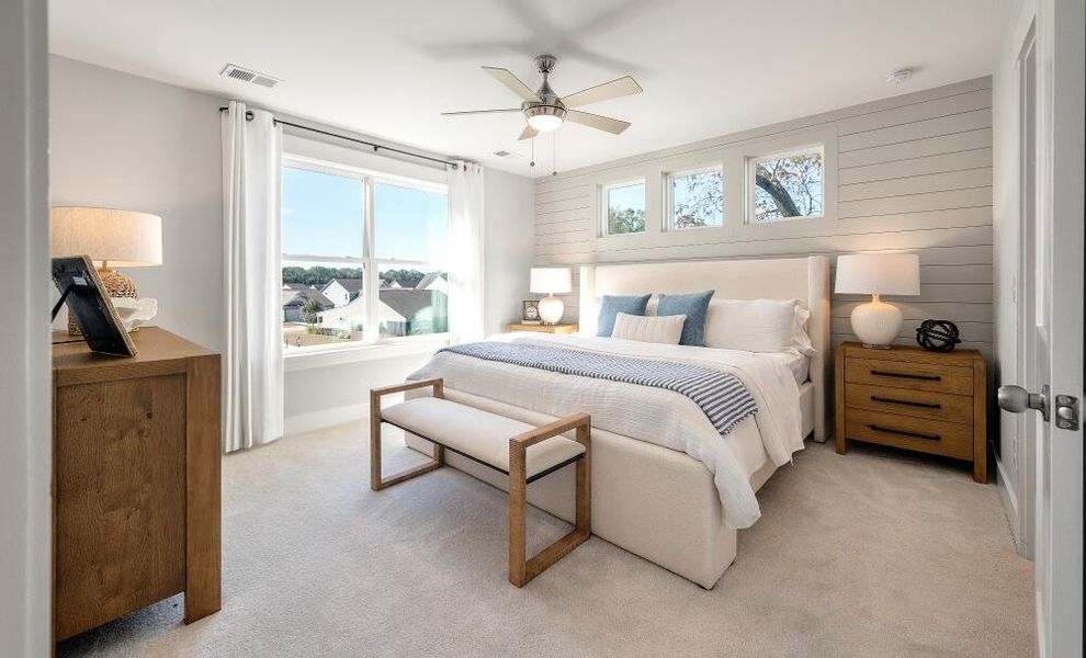 Furnished interior in a model home at New Riverside Village in Bluffton (Image 9).