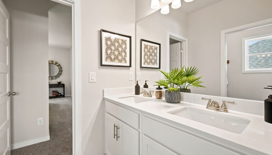 Furnished interior in a model home at Fowler Farms in Auburn (Image 99).