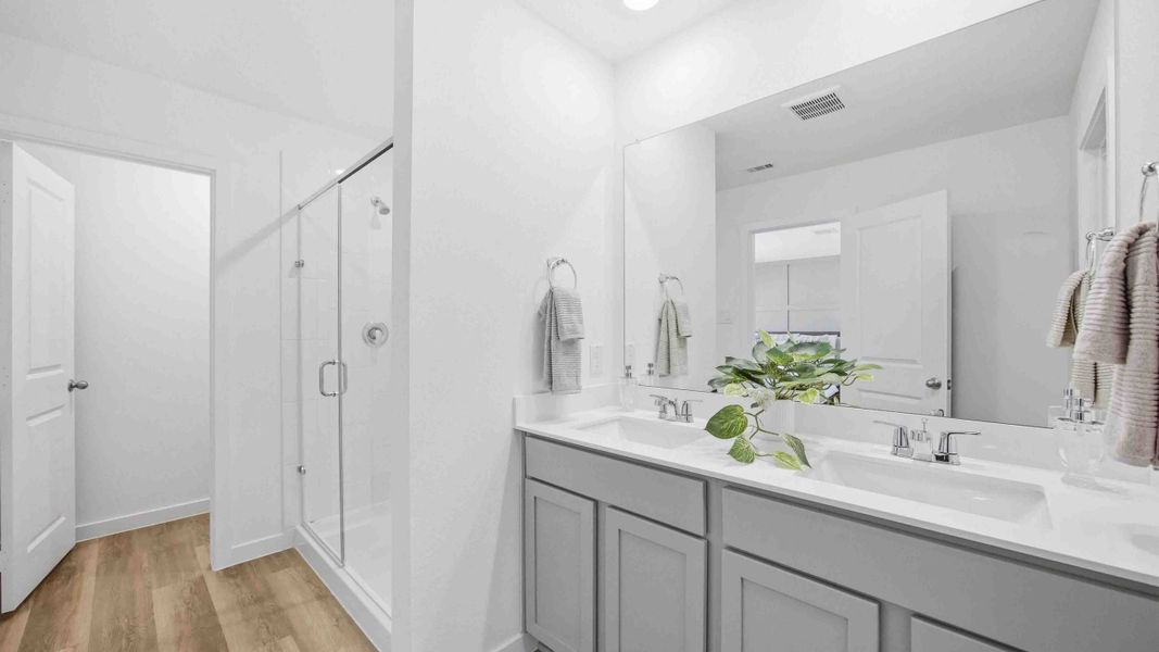 Furnished interior in a model home at Mansfield Park in Houston (Image 16).