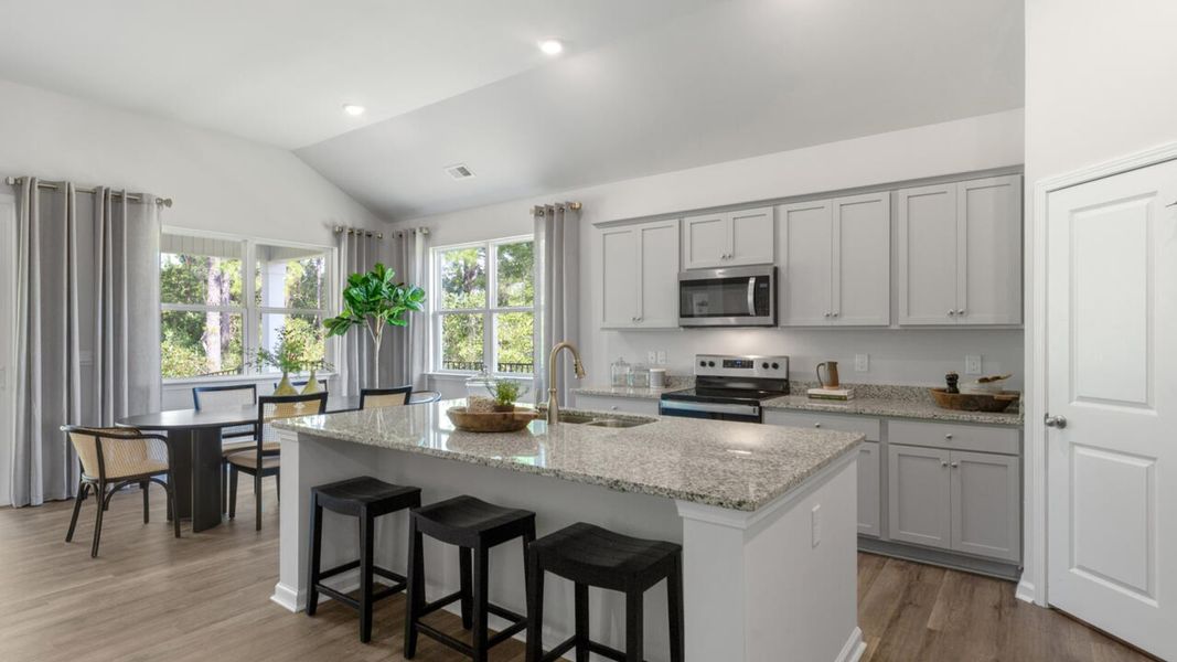 Furnished interior in a model home at Grayson Park in Leland (Image 6).