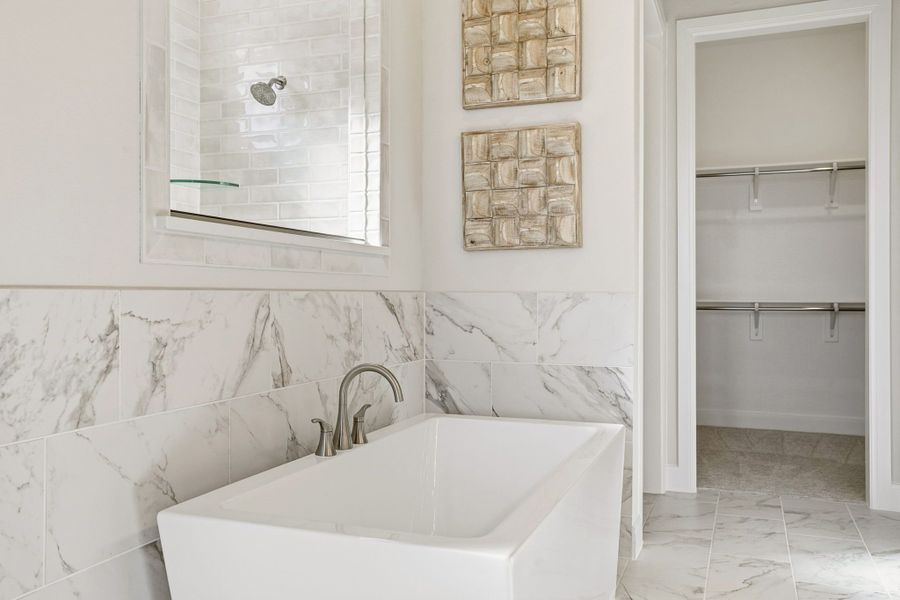 Furnished interior in a model home at Lily Creek at Sutton Fields in Aubrey (Image 54).